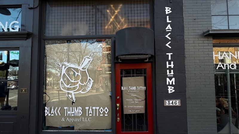 Blacc Thumb Tattoo